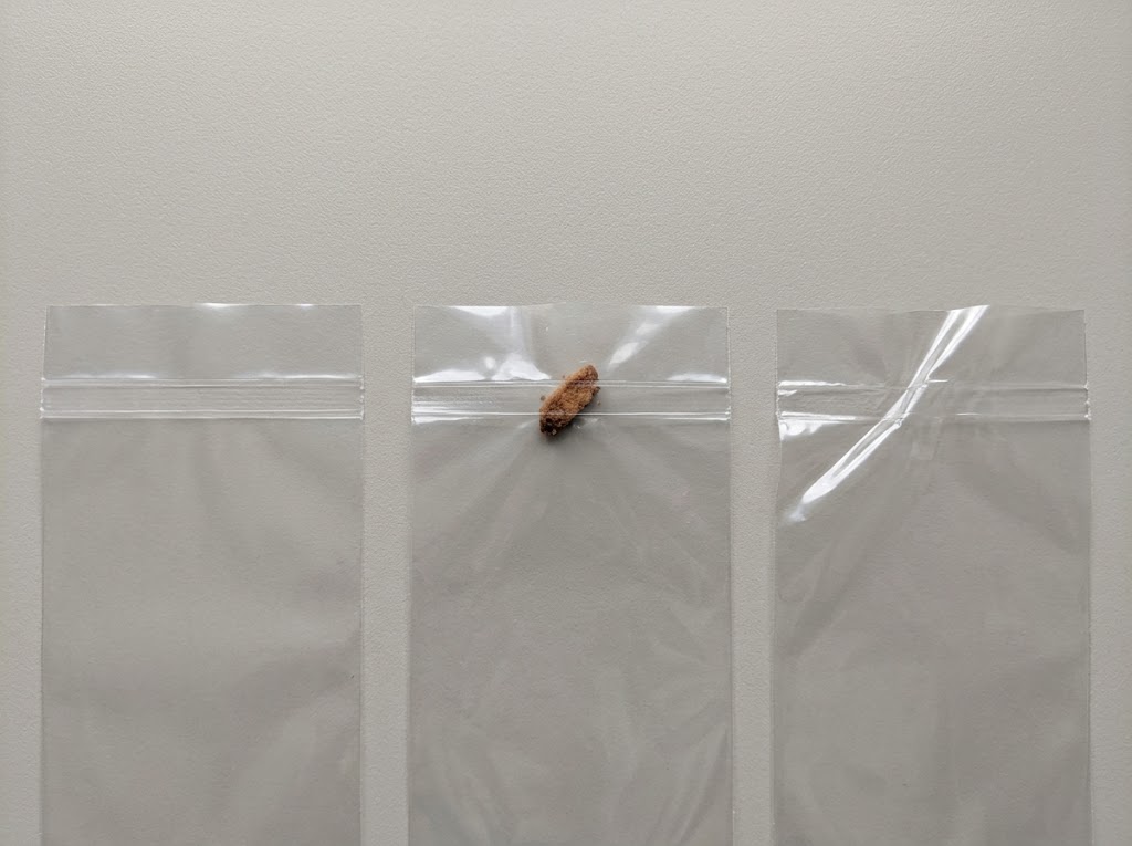 Three clear bag tops showing a flat band, a crumb crossing the band and a wrinkled corner
